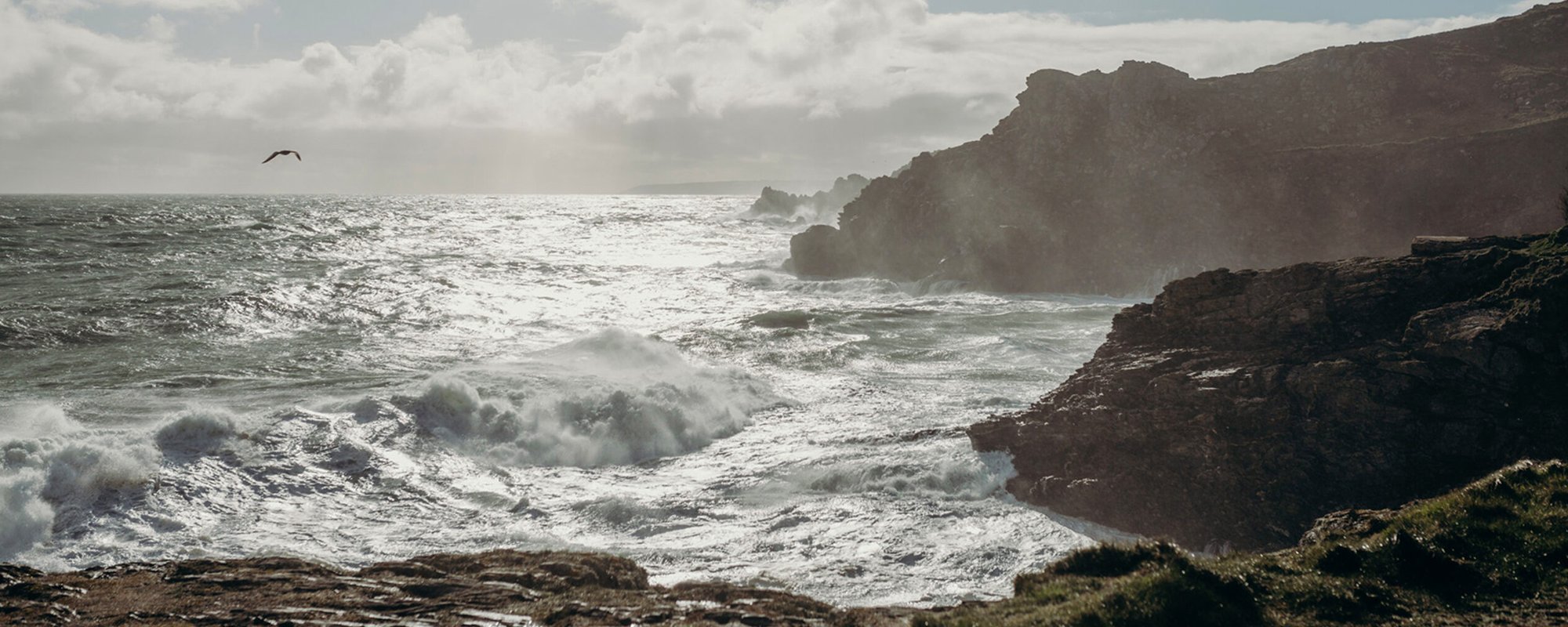 Cornish coastal view with crashing waves