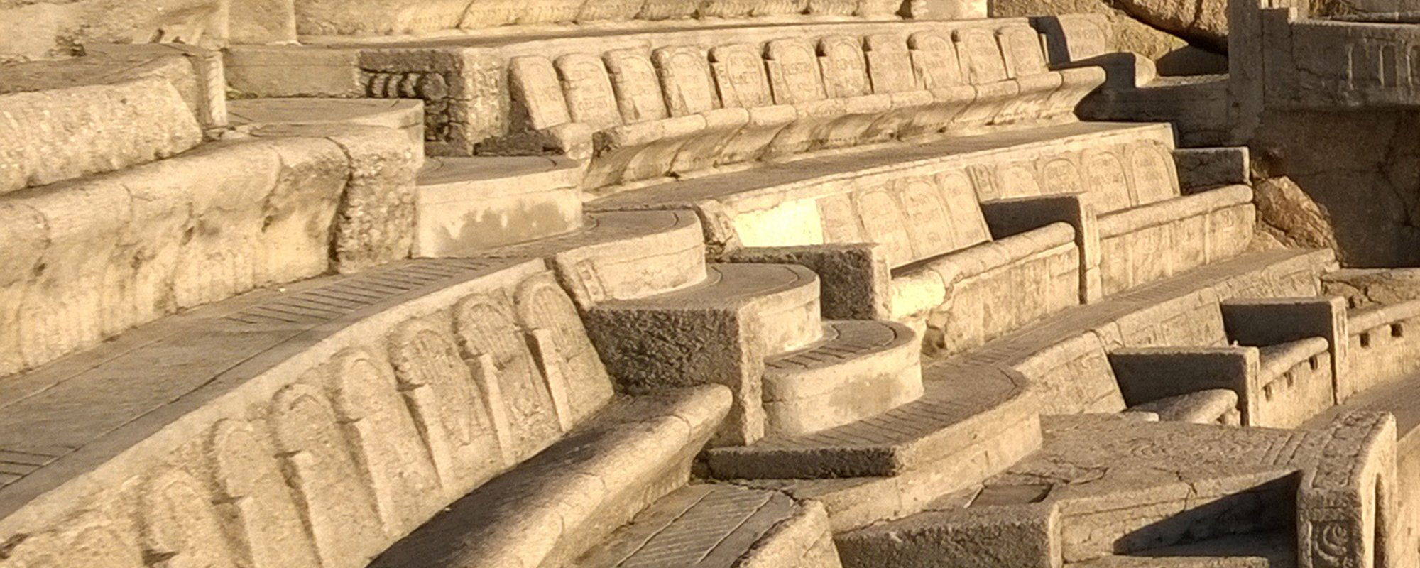 Close up of concrete seating in morning light