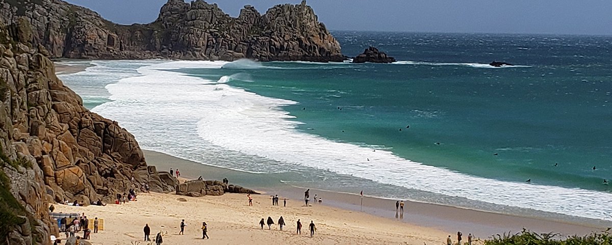 Porthcurno Bay with Logan Rock