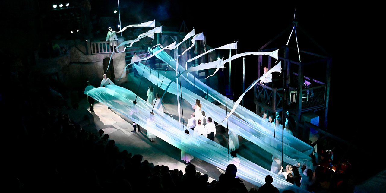 Actors performing on the Minack stage