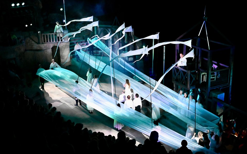 Actors performing on the Minack stage