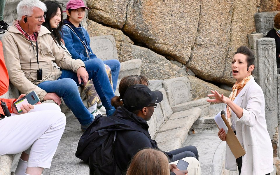 Rebecca Hulbert leads an interactive tour with visitors